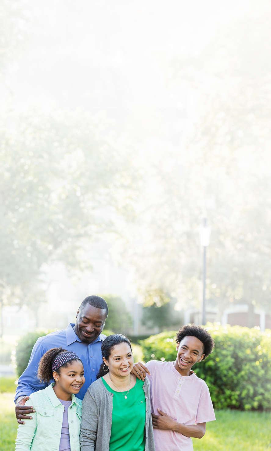 Smiling Family Enjoying Park.